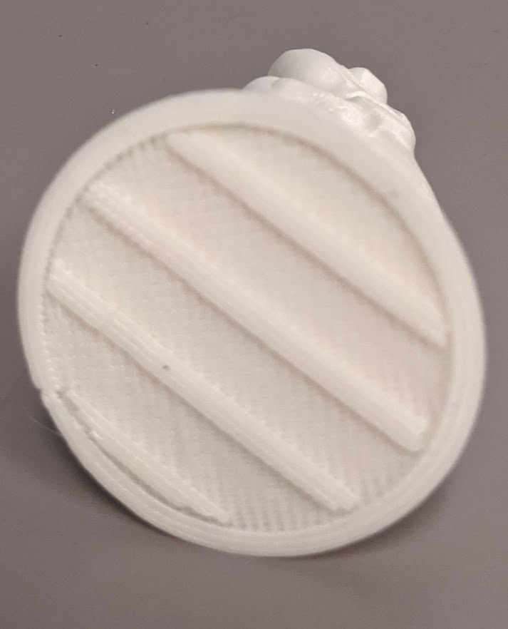 detail of 3D printed raft, showing stripes with meshed infill