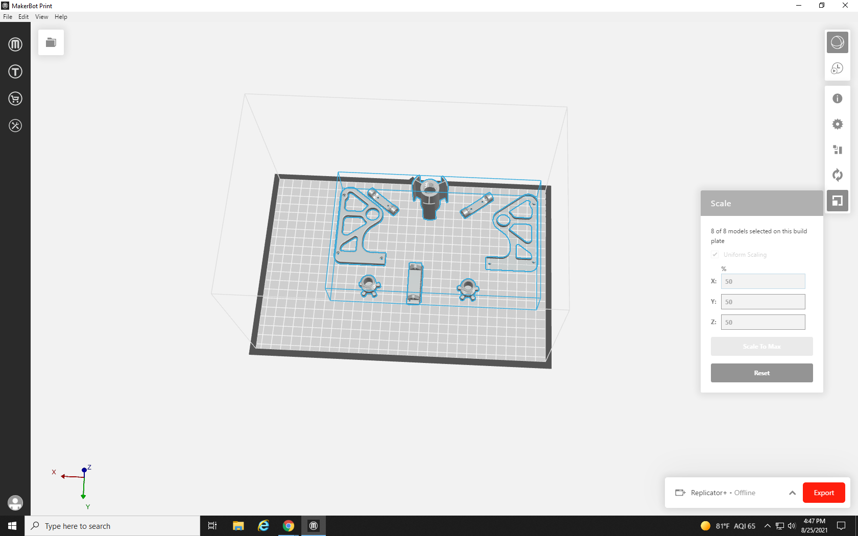 Screenshot of MakerBot Print build plate with all objects on it scaled to 50%
