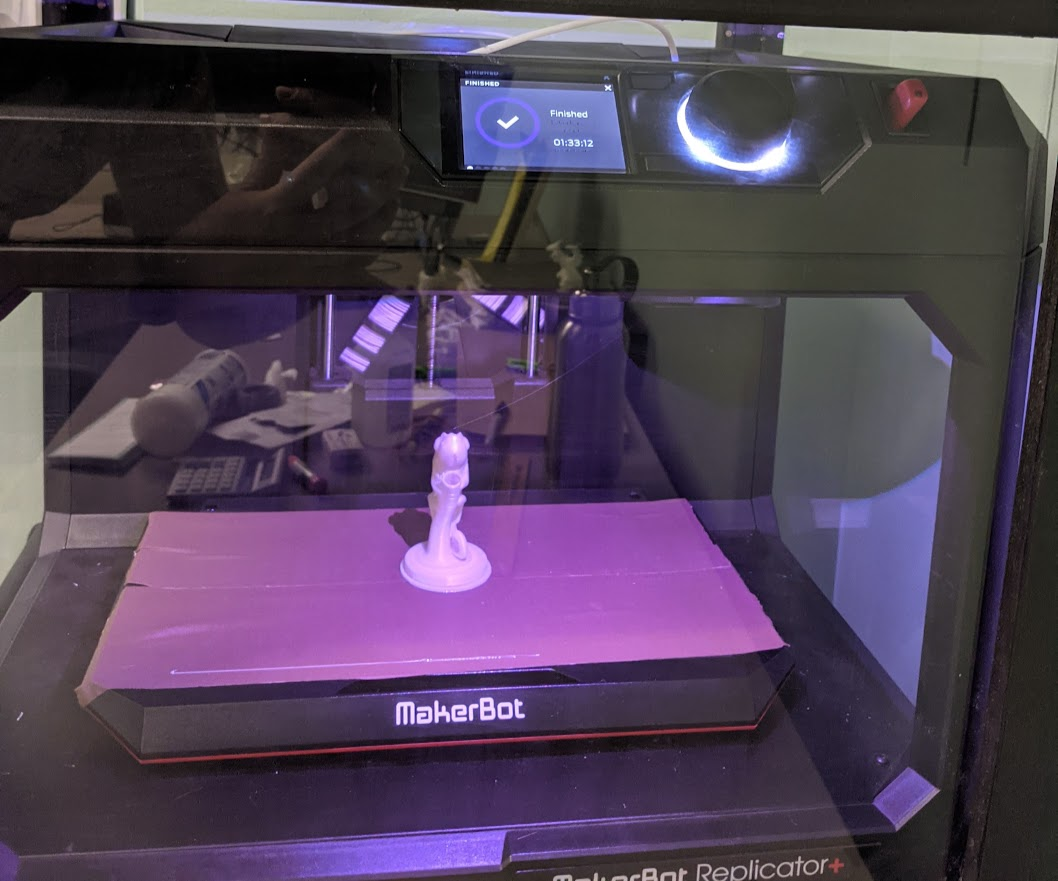 A successfully completed 3D print of the chameleon pen holder on the MakerBot Replicator+ print bed