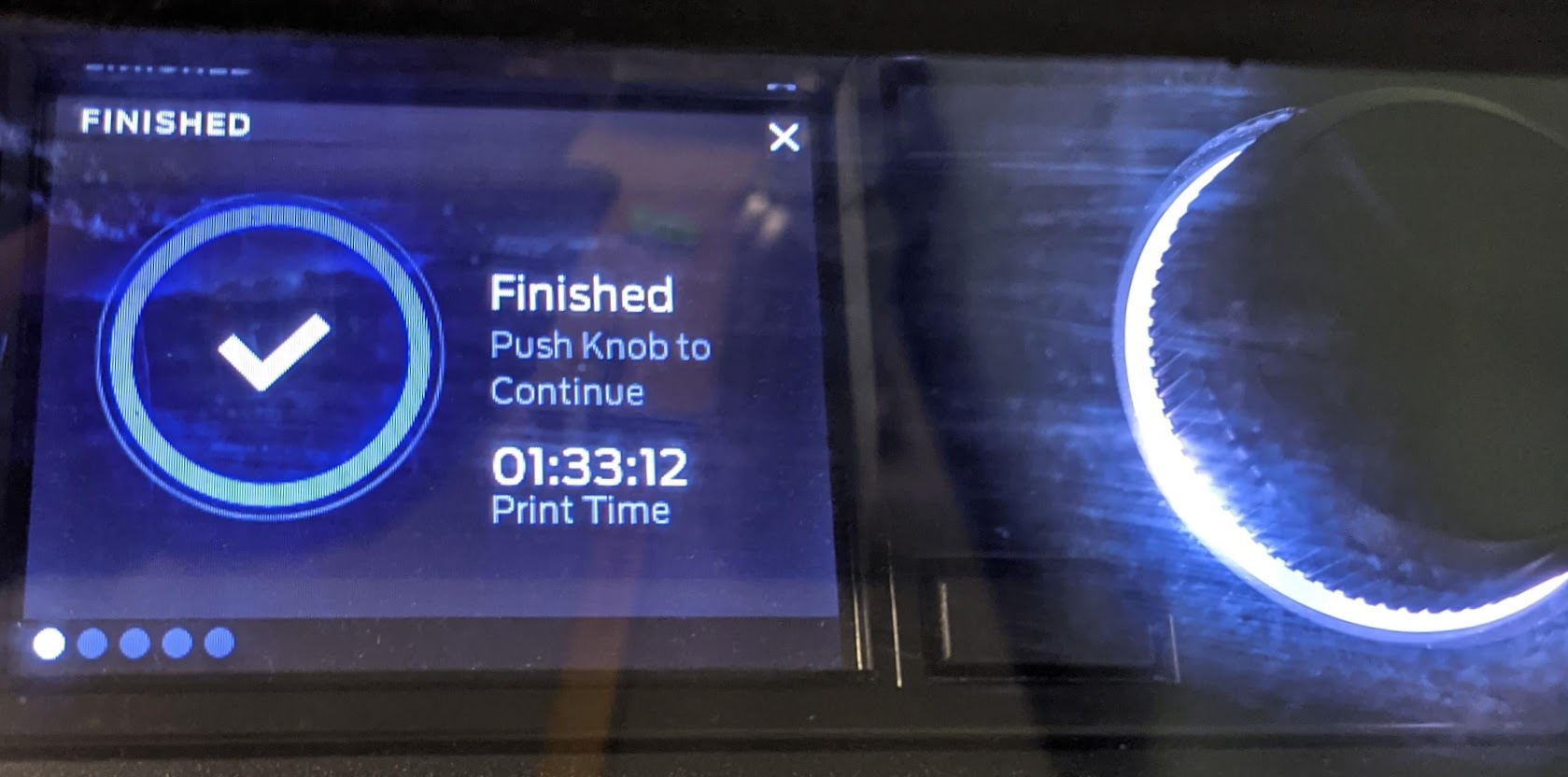Close up of the MakerBot Replicator+ showing that the print has finished