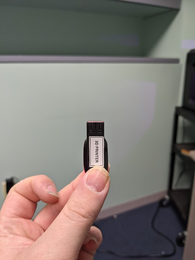 A flash drive labelled "3D printer"